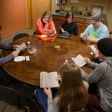 Community Montessori Photo #2 - Teen learners in a seminar with an adult Adviser.